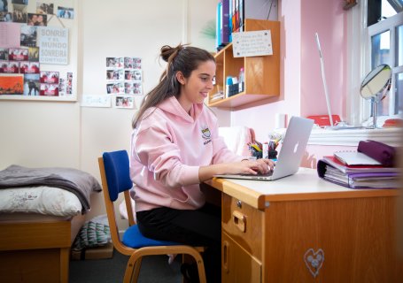 Girl in boarding at Ratcliffe College studying in bedroom. Independent Catholic Boarding School