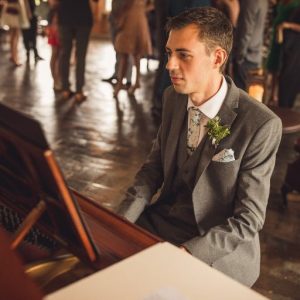 Ratcliffe College teacher playing piano